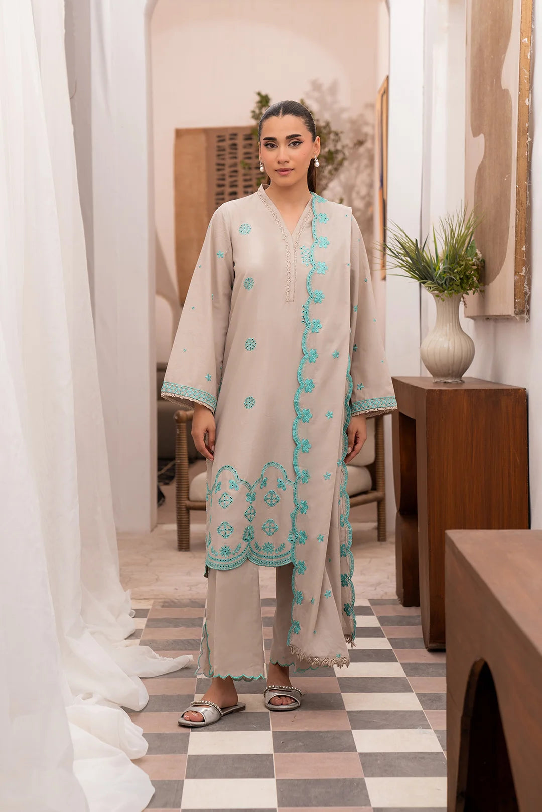 3 Piece Embroidered Lawn Suit - Elegant unstitched embroidered lawn suit with lawn dupatta, available online in Pakistan.