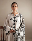 3_piece_stitched_pret_lawn_suit_for_women_in_modern_black_and_white_geometric_print_design.