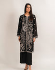 A stylish black two-piece suit, featuring a tailored shirt or kameez and trousers, perfect for formal occasions