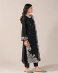 Black and white embroidered lawn suit – perfect for Eid and summer wear in Pakistan, UK, and USA