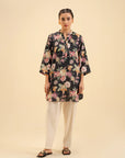 Black floral cambric shirt for women – trendy and elegant Pakistani kurti.