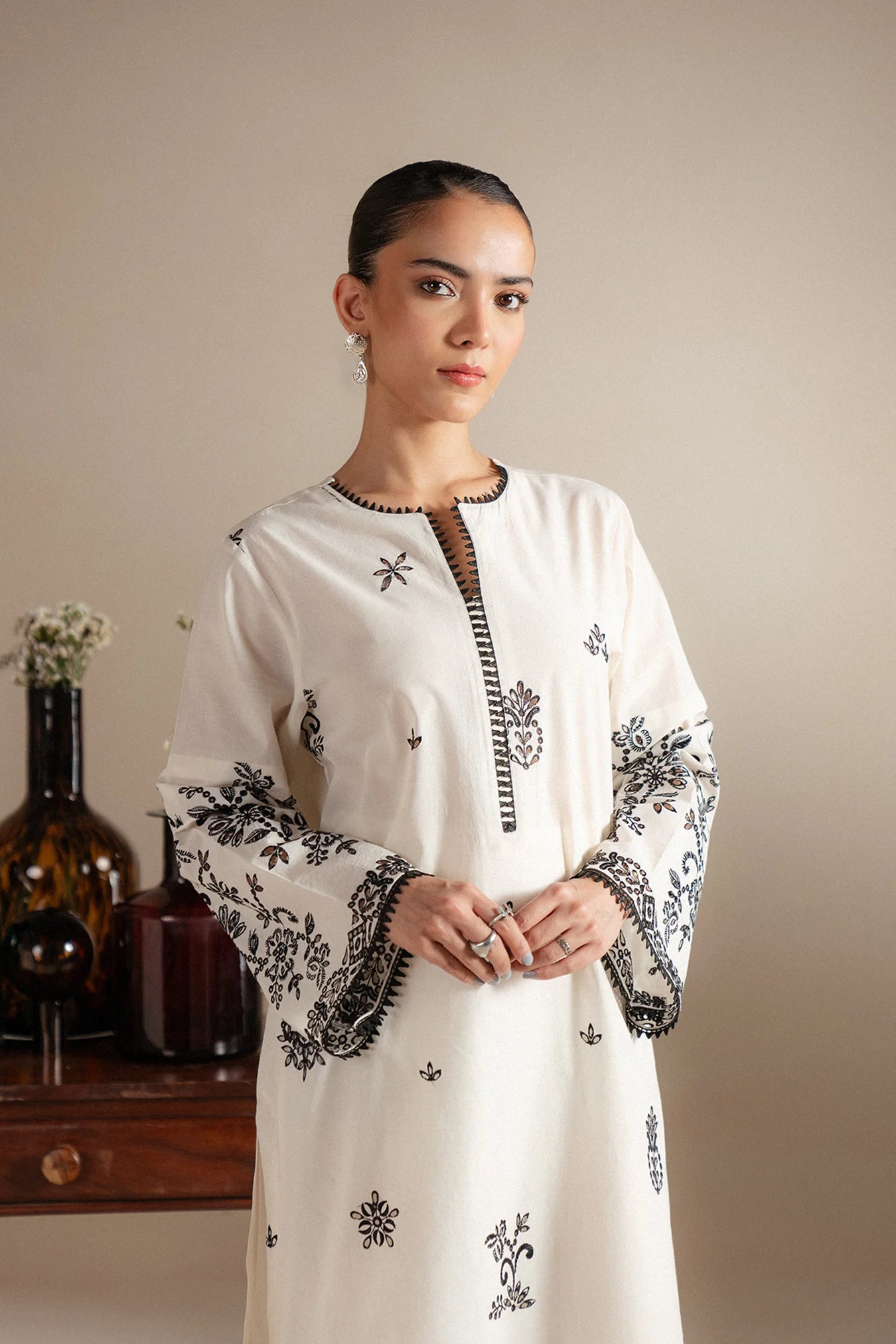 Book monochrome kurta set Rawalpindi - white 2 piece lawn suit embroidered black detail work
