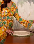 Bright yellow printed linen kurta – energetic and chic Pakistani fashion for seasonal trends.