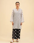 Buy black & white polka dot cambric suit – trendy two piece for women.