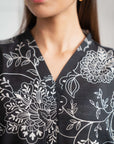 Buy online 1-piece Karandi shirt with a striking black and white composition for women