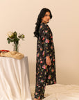 Buy online chic and classy black cambric two-piece suit, featuring colorful digital prints