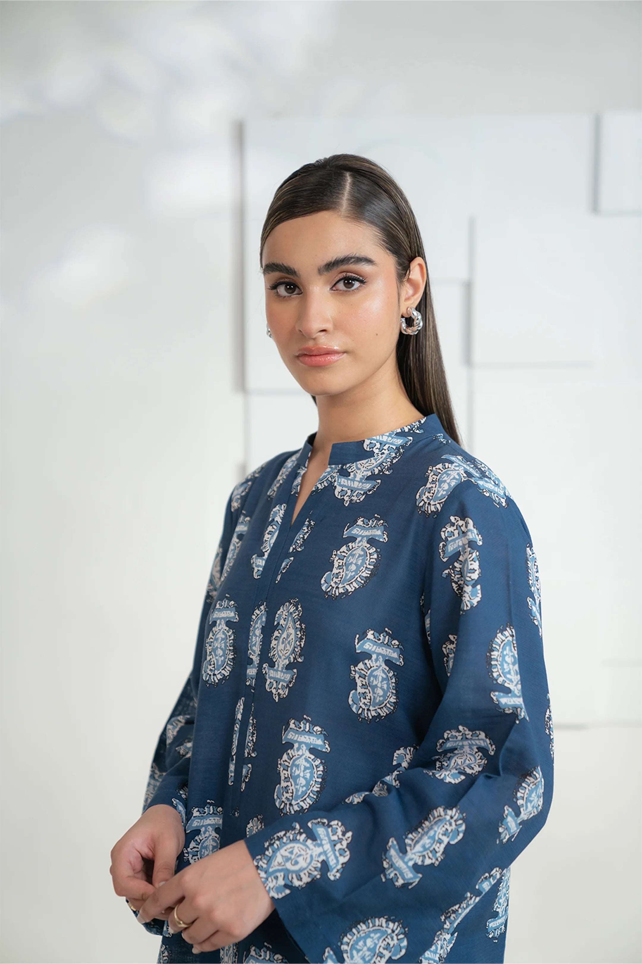 Buy online from Beyond East’s latest 2-piece printed khaddar suits for cozy outfits.