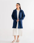 Casual and cozy navy blue cardigan, featuring a relaxed fit, hood, and spacious pockets.