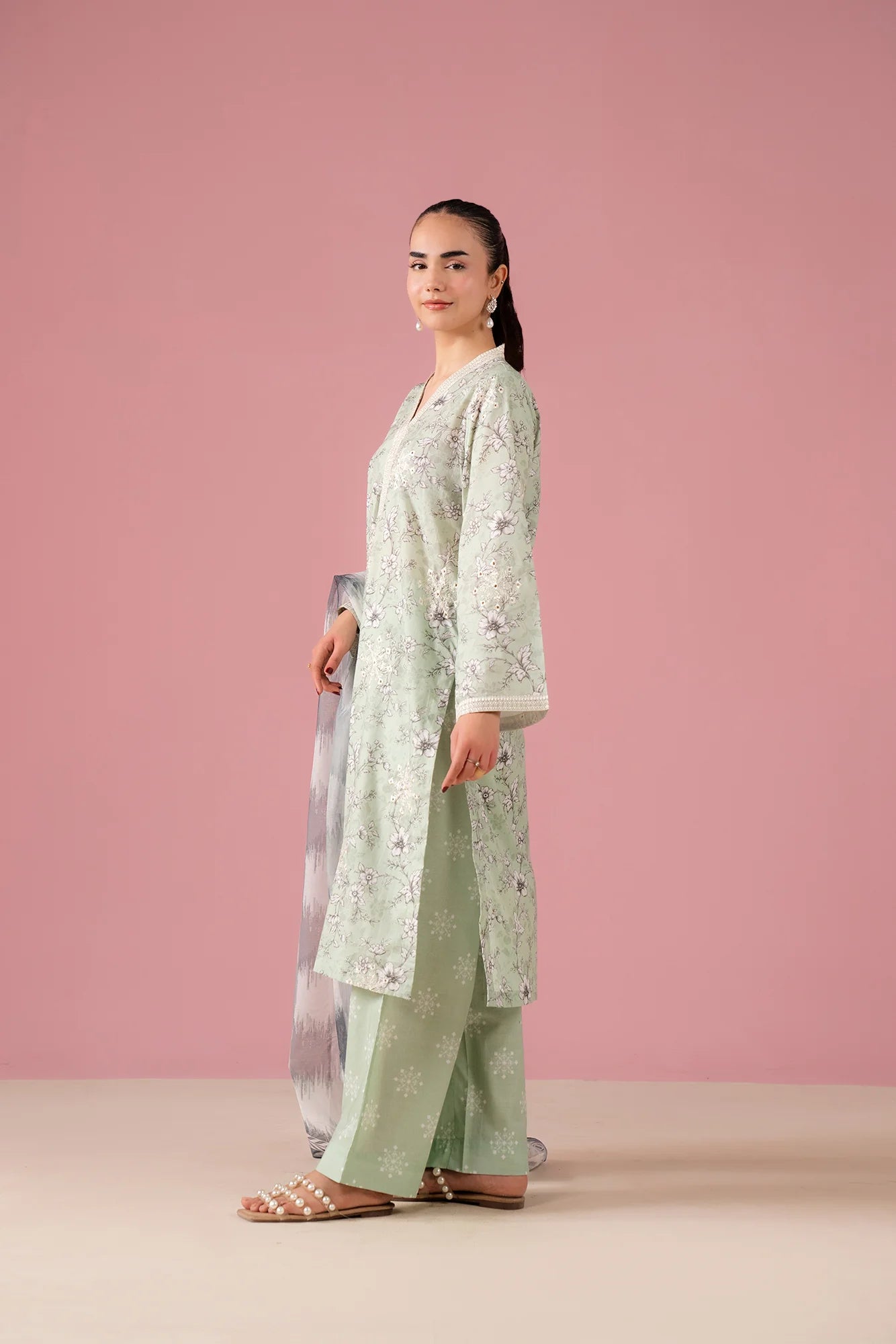 Chic 3-piece lawn suit with delicate organza embroidery and digital prints, tailored for women in Rahim Yar Khan's F-Block Pakistan