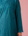 Chic teal lawn suit with detailed embroidery on front, hem, and sleeves, completed with matching trousers and silk dupatta, designed for women in Gujrat's DHA Phase I