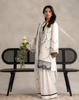 Classic white lawn outfit with black embroidery, dupatta, and flared trousers for summer wear.