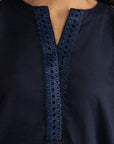 Close-up of navy blue kurta neckline with stitched placket detailing.