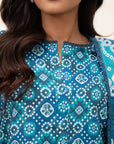 Close view of teal geometric print on linen shirt showing neckline detail