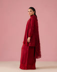Crimson embroidered raw silk Pakistani suits for weddings