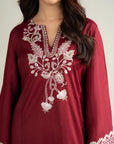 Red raw silk pret suit close up white resham embroidery neckline detail 2 piece Pakistan Beyond East 2026