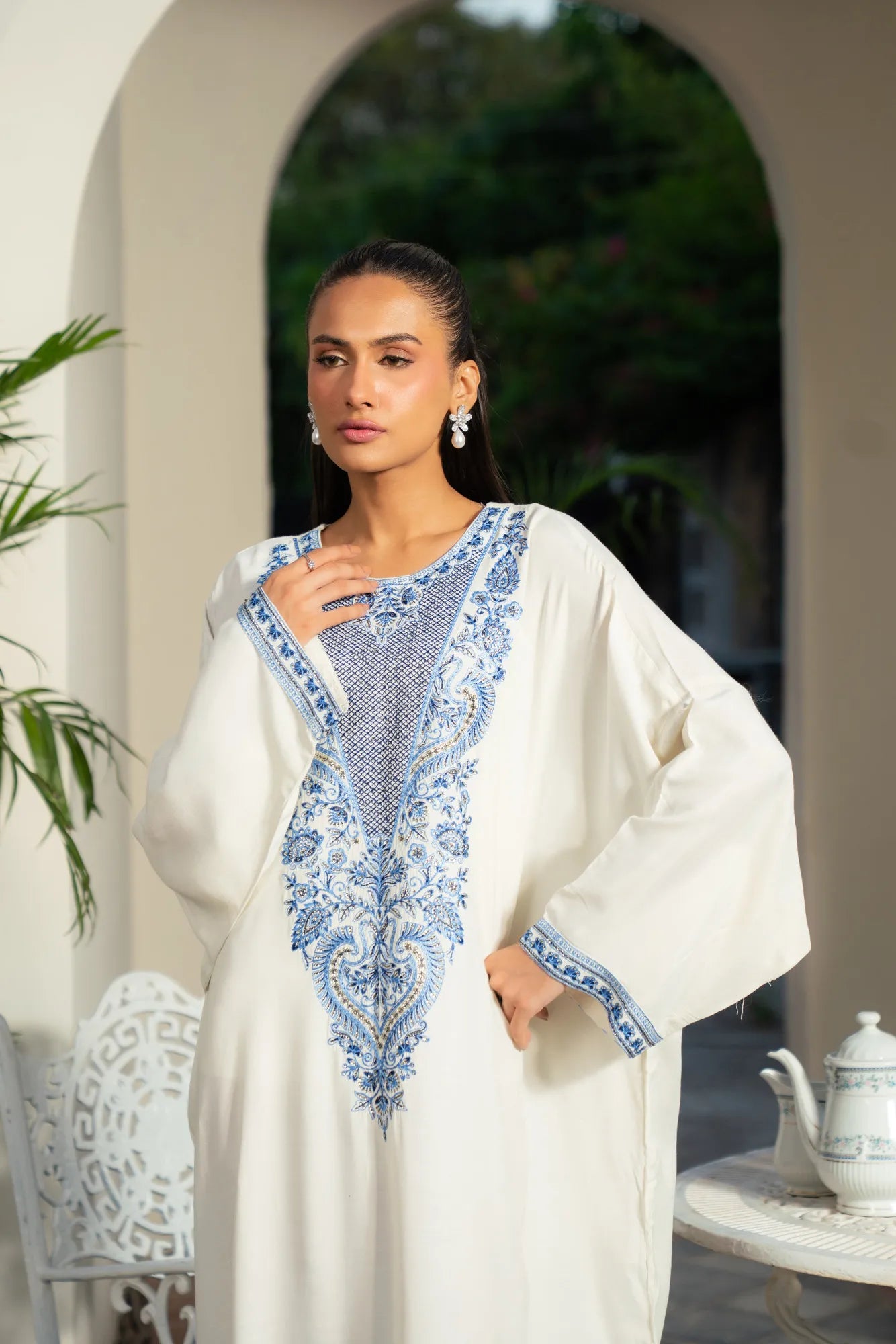 Modern kaftan style dresses in embroidered raw silk for winter