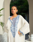 Modern kaftan style dresses in embroidered raw silk for winter