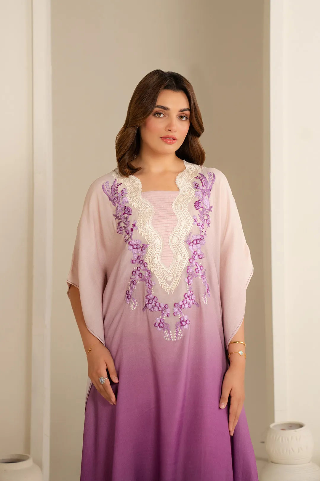 Luxury embroidered kaftan dresses in raw silk by Beyond East