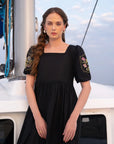 Black cambric midi frock side view - women festive wear
