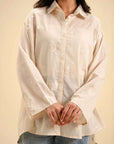 Elegant embroidered cambric shirt – versatile button-down top for all seasons.