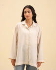 Elegant long-sleeve off-white shirt – must-have fashion staple for every wardrobe.