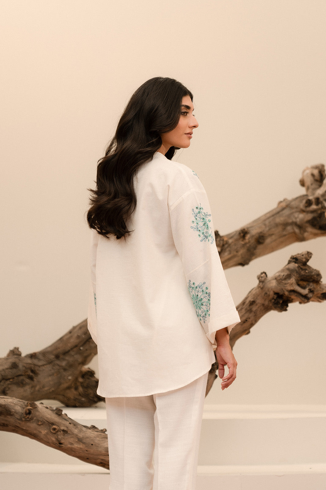 Elegant off-white embroidered khaddar shirt, 1-piece design perfect for formal occasions
