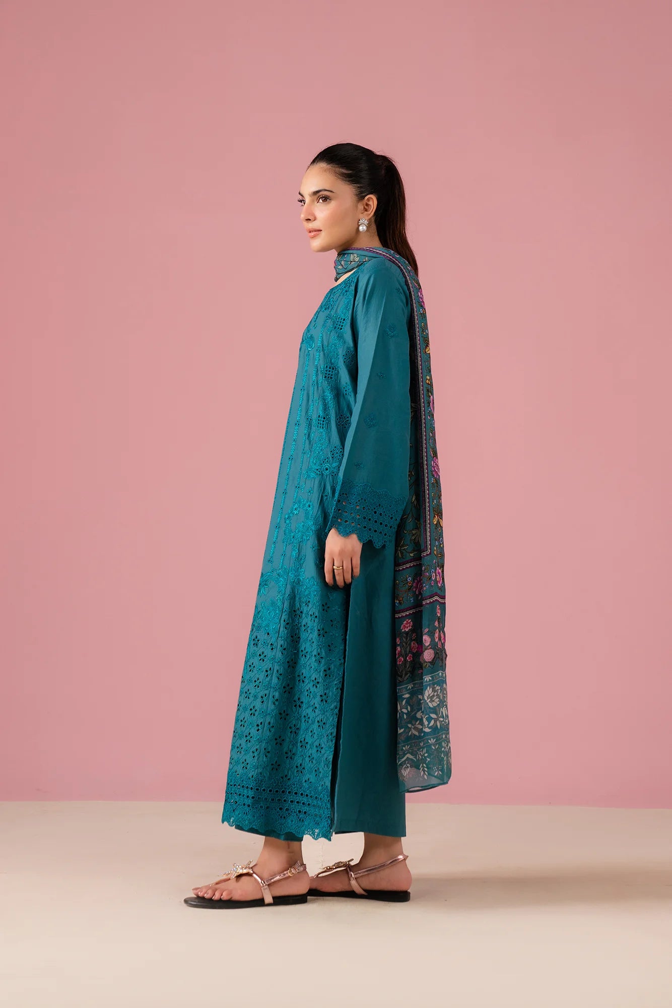 Elegant teal lawn kurta with intricate embroidery and cutwork, paired with silk dupatta and trousers, ideal for women in Gujrat's Model Town upscale neighborhoods