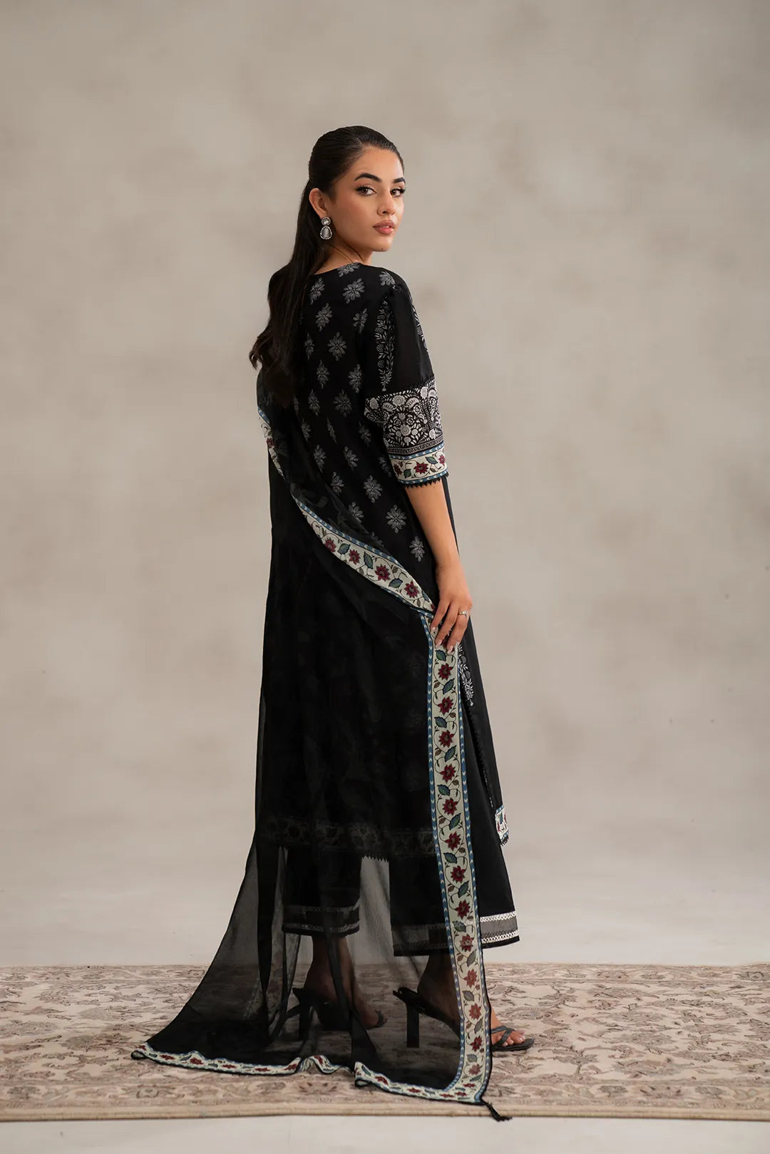 Elegant unstitched lawn suits online – black digital printed 2-piece with chiffon dupatta, trending ethnic wear for Pakistani ladies in USA & Middle East.