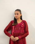 Front view of embroidery work on maroon chiffon shirt, festive look