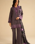 Full-length view of purple embroidered linen suit with matching trousers and printed shawl, styled for an elegant look