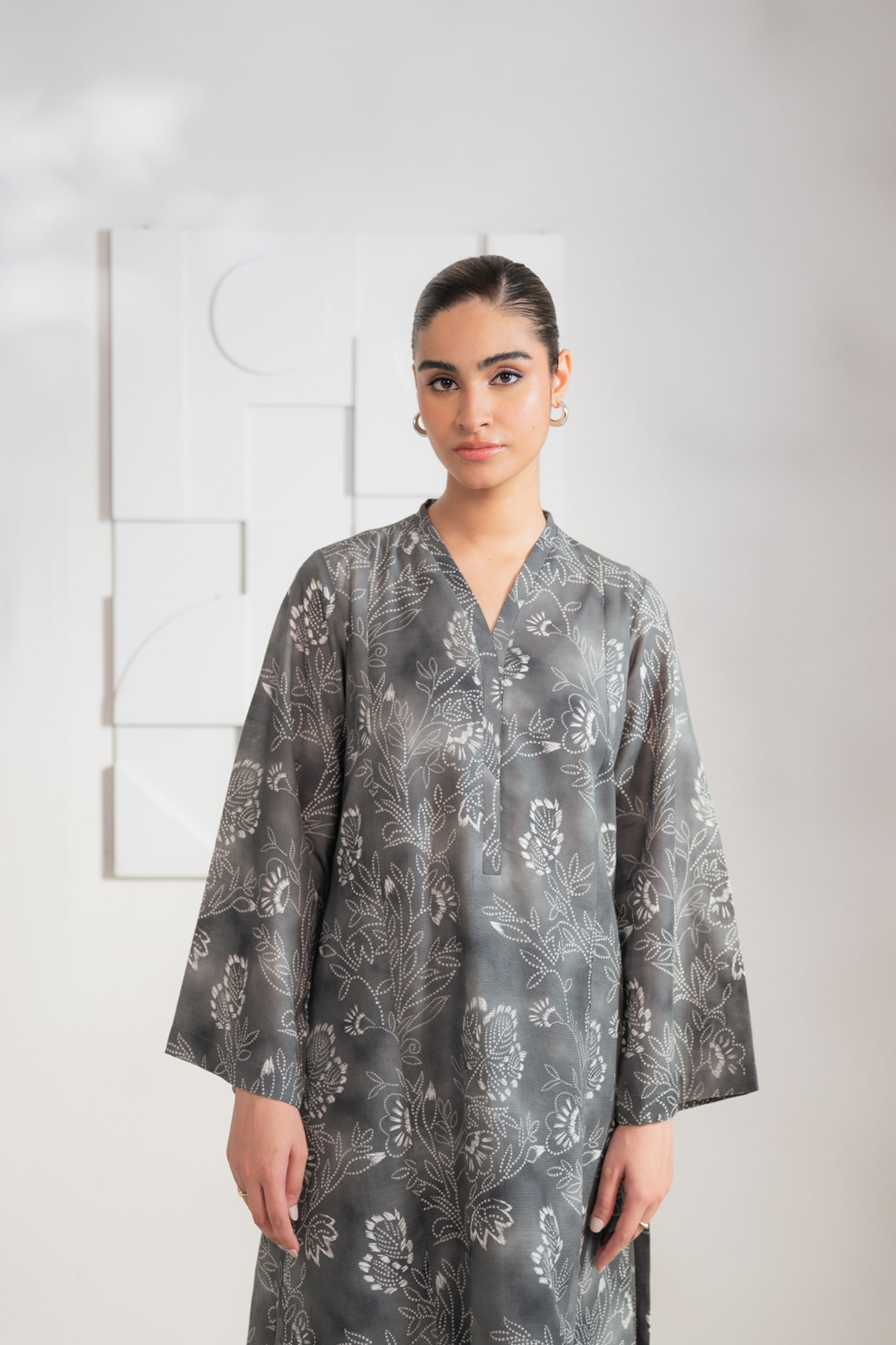 Get 2-Piece Printed Charcoal Khaddar Suit – Trendy and Versatile for Women’s Fashion