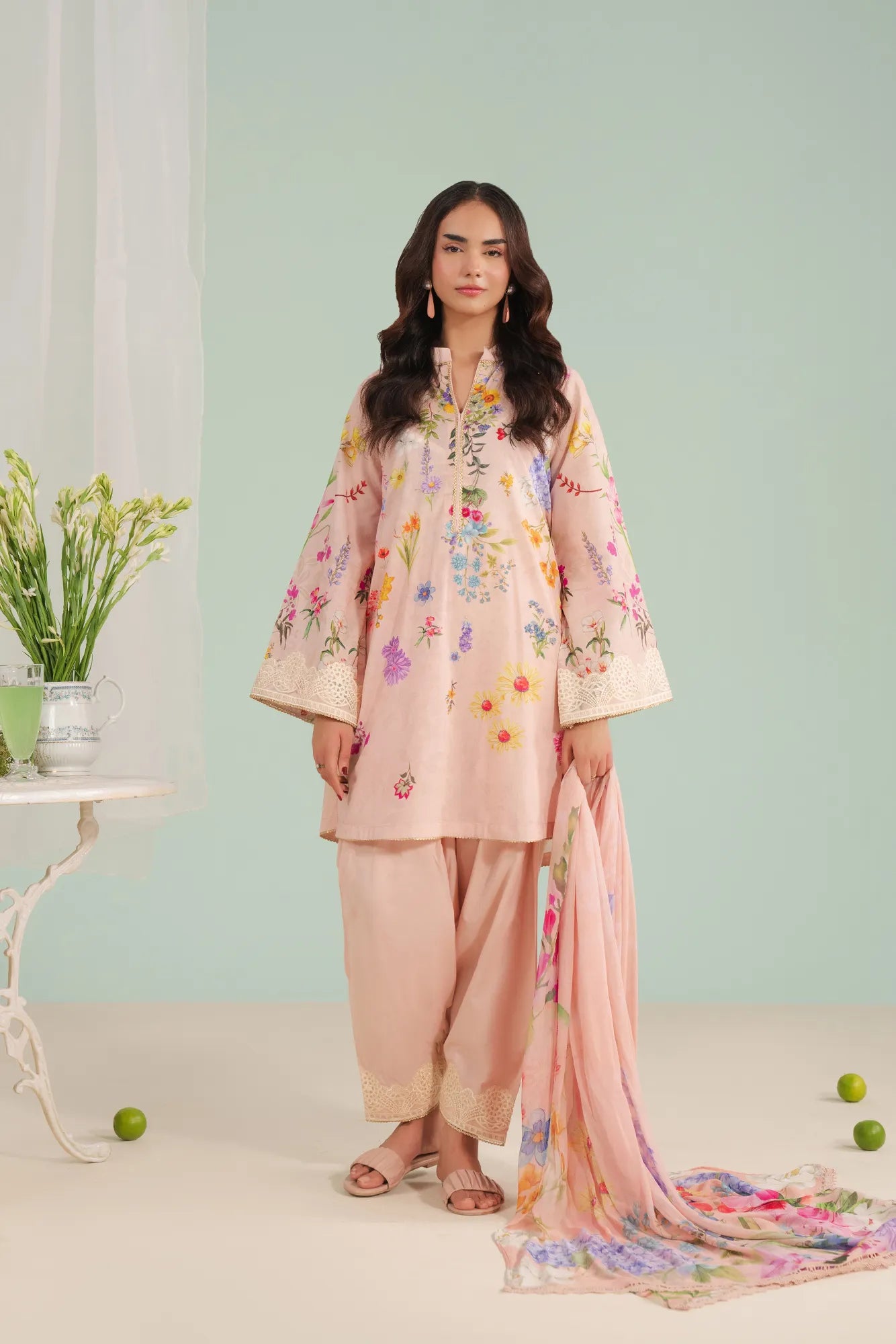 Get Peach 3-piece embroidered lawn suit with digital printed shirt, organza border, cambric trouser, and chiffon dupatta – elegant ladies unstitched lawn suits