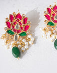 Gold Design Jhumka Traditional lotus-inspired meenakari earrings with pearls and green stone