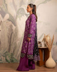 Latest Pakistani lawn suit with digital floral prints, a stylish purple shirt paired with a soft black dupatta adorned with intricate border details.