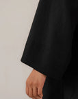 Loose fit button-down black shirt for women perfect for casual wear