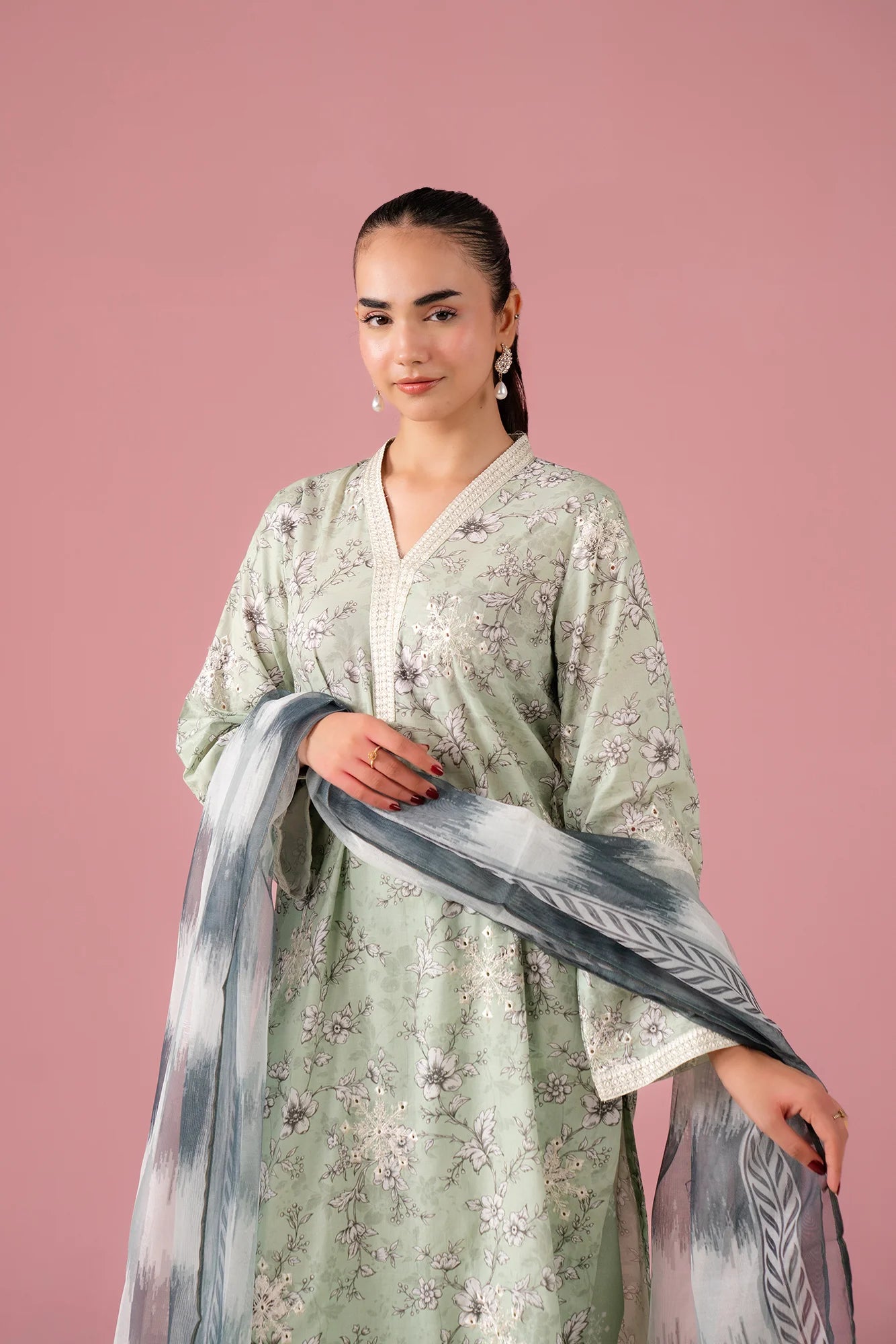 Luxury 3-piece printed lawn dress with embroidered neck and chiffon dupatta, perfect for women living in Rahim Yar Khan's Midtown high-end area