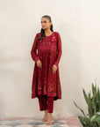 Model wearing maroon embroidered chiffon 3-piece suit with matching dupatta, full length view