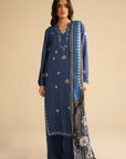 Model wearing royal blue 3 piece embroidered linen suit with printed shawl, full front view in studio