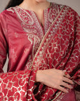 Modest fashion 3 piece jamawar dress for women – embroidered red suit with long shirt, loose trousers, and sheer dupatta for formal occasions.