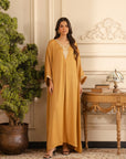 Mustard yellow Pakistani kaftan dress with gold embroidery