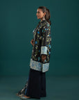 New lawn suit design in Pakistan – digital printed black lawn shirt with blue floral motifs, paired with a statement chiffon dupatta for a sophisticated touch.