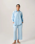 Oversized light blue ladies poplin shirt, a classic button-down with a crisp, relaxed fit.