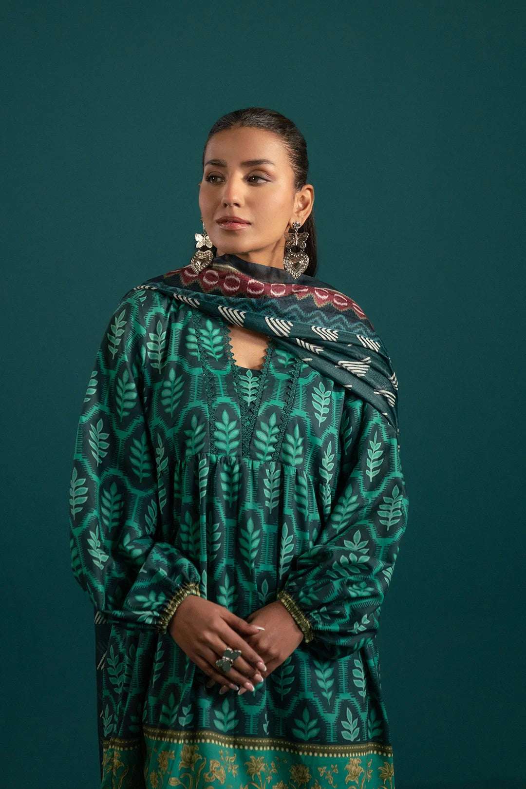 Pakistani Lawn Suits for Women – Stylish & Trendy – A must-have green lawn suit with intricate patterns, a chic border, and a beautifully printed dupatta, perfect for casual and festive wear.