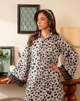 Pakistani cambric dress – chic black and white patterned kurta and trouser set for stylish casual wear.