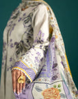 Pakistani lawn suits featuring a sophisticated white and purple floral-printed lawn shirt with an embroidered border and a flowing chiffon dupatta.