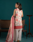 Pakistani lawn suits in vibrant colors – an off-white three-piece ensemble with abstract red prints, a printed dupatta, and stylish trousers.