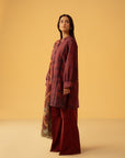 Pakistani unstitched dress material, maroon cambric shirt and dyed trouser with printed silk dupatta, perfect for festive wear in Lahore