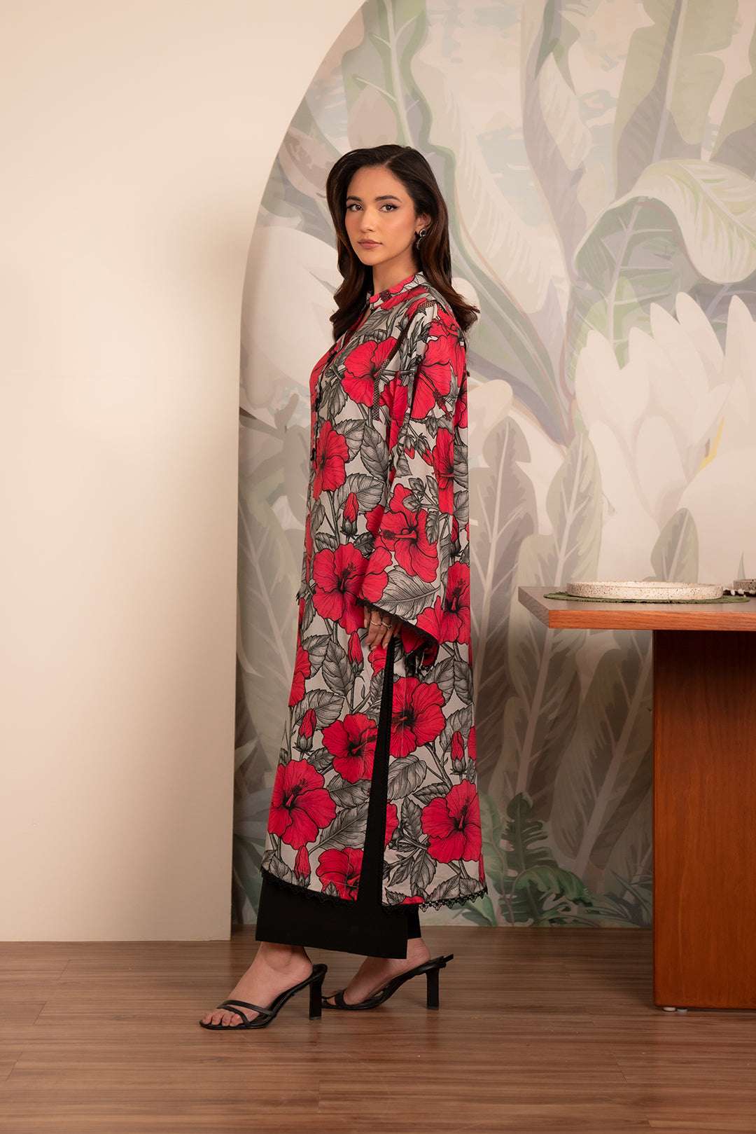 Pakistani winter linen kurti – striking red and black floral design on soft grey fabric for stylish women.