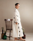 Ready-to-wear monochrome lawn suit for women with black embroidery on ivory fabric
