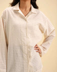 Relaxed-fit button-down shirt for women – perfect for work or weekend looks.